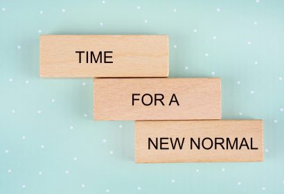 Wooden blocks with words Time for a new normal